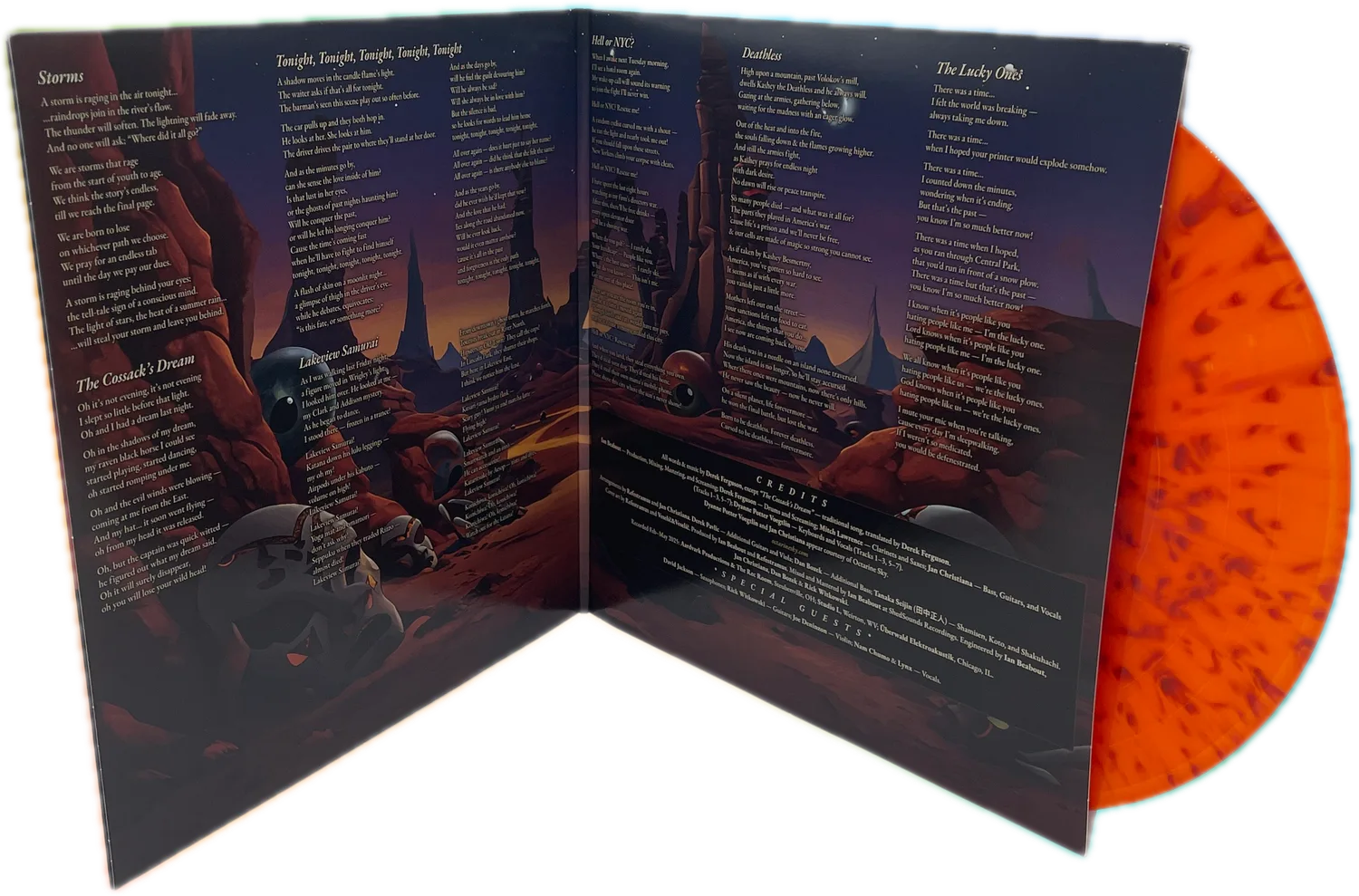 The gatefold sleeve opened flat, lyrics and credits printed over desert artwork, with the orange splatter disc sliding out